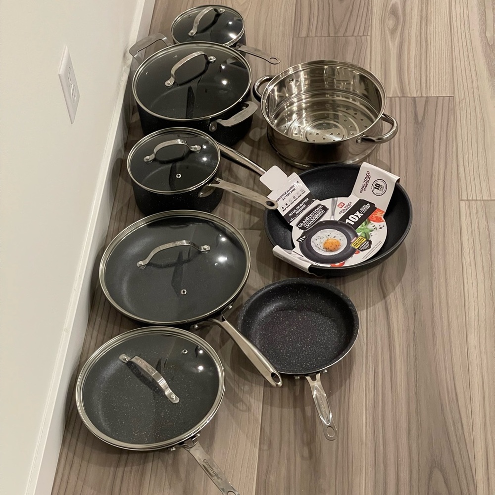 13 piece cookware set as shown in picture. Never used! Got it as a gift.